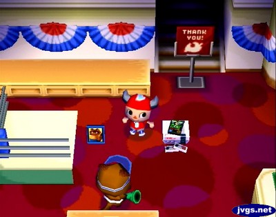 Tom Nook displays his own photo as a raffle prize in Animal Crossing.