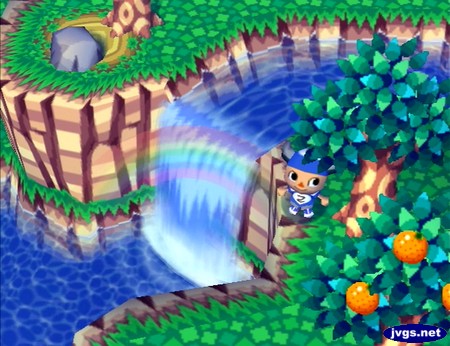 A rainbow appears in the waterfall in Animal Crossing for Nintendo GameCube.