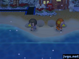 Jeff and Skye, both wearing beaks, run in place while facing opposite directions on the beach.