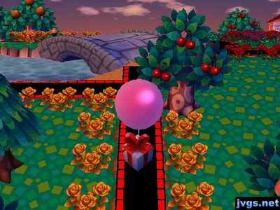 A present floats by on a pink balloon in ACCF.