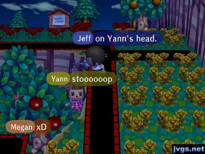 Jeff stands on a cliff and sprinkles water on Yann's head down below.