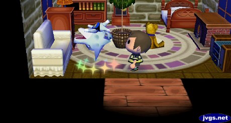 Whitney flips as she takes her medicine in Animal Crossing: City Folk.