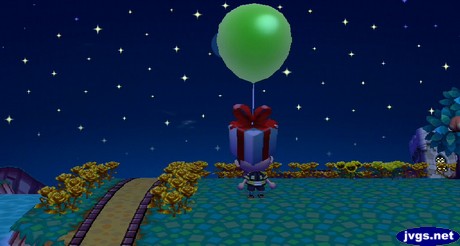 A green balloon present flies over Jeff.