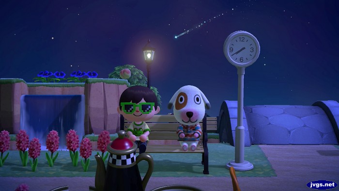 Jeff and Bones sit on a bench as a shooting star flies overhead.
