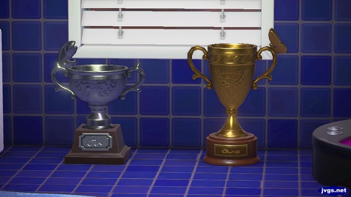 My silver fish trophy and (new) gold bug trophy.