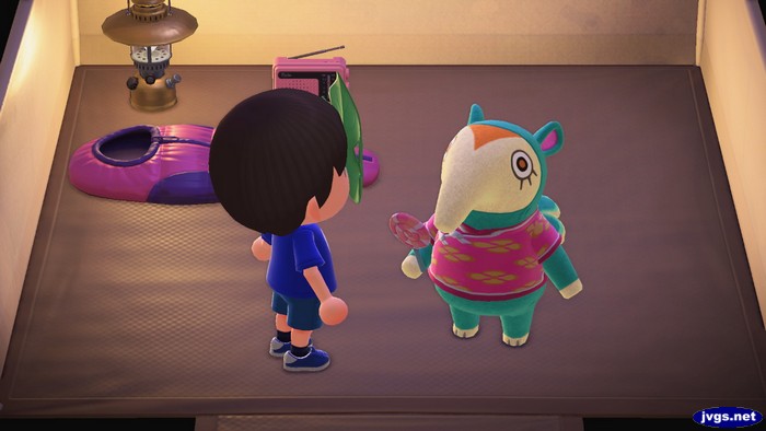 Zoe holding a lollipop while camping at the campsite in Animal Crossing: New Horizons (ACNH).