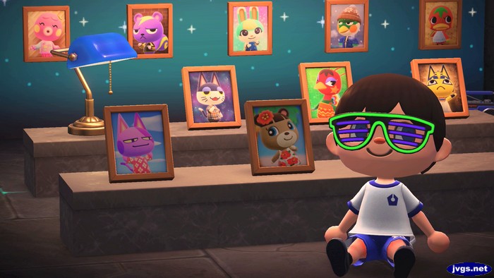 June's photo on display, next to Bob's. Other villager pics can be seen in the background.