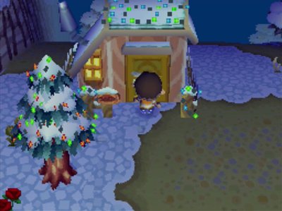 Festive lights on Kiki's house for Bright Nights in Animal Crossing: Wild World.