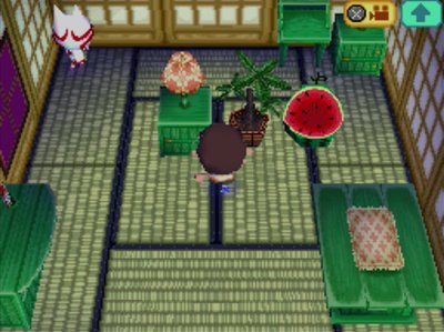 Kabuki's house of green furniture in Animal Crossing: Wild World.