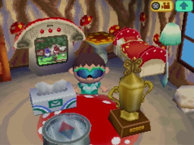 A box of tissues placed on a table in a mushroom-themed room in Animal Crossing: Wild World.