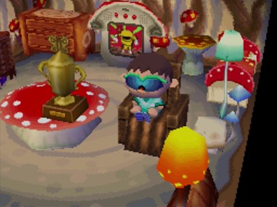 Trying out the massage chair in Animal Crossing: Wild World.