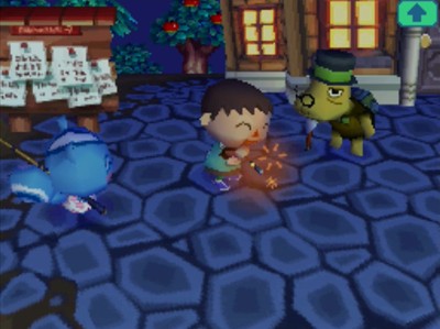 Setting off a sparkler as Filbert and Tortimer watch.