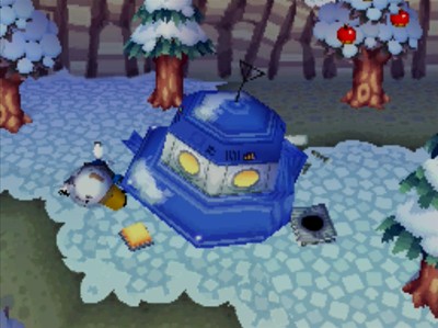 Gulliver lies next to his crash-landed UFO in the snow.