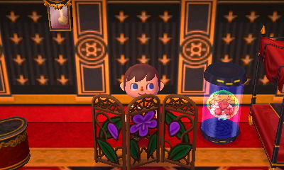 Jeff displays the violet screen in Animal Crossing: New Leaf, near his Metroid.