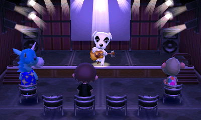 K.K. Slider performs as Julian, Jeff, and Elise look on.