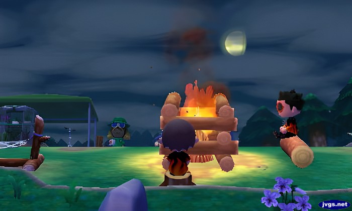 Sitting by the fire at the campground in New Leaf.